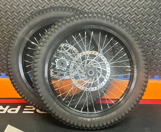 eMoto Shinko 241 Dual Sport 17"/17" front and rear wheel and tire set for eMoto moto bikes, delivering outstanding traction and performance on both off-road trails and on-road surfaces, designed for durability and smooth handling in all conditions.